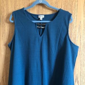 Tank with metal detail in front